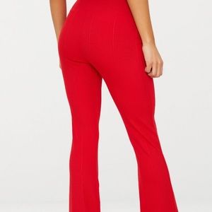 PRETTY LITTLE THING RED BANDAGE FLARED TROUSER